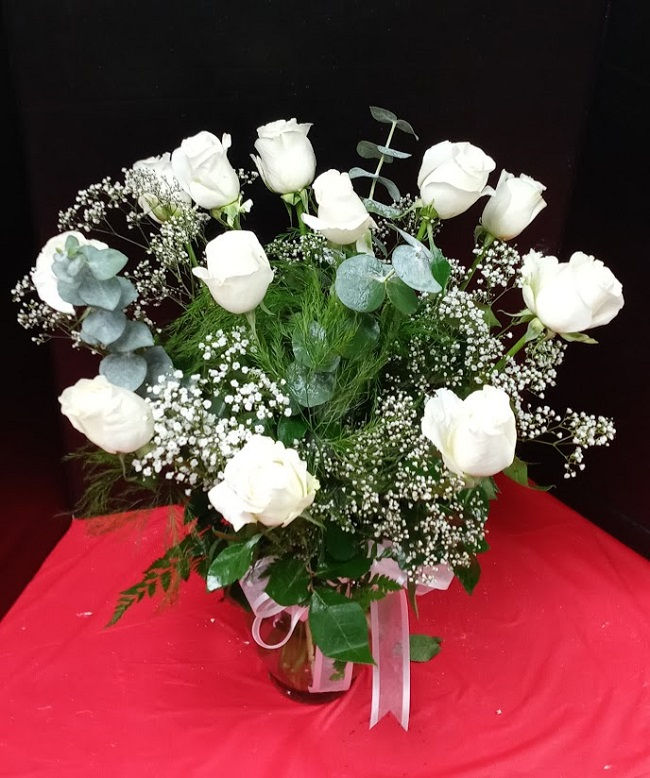 white roses in a vase