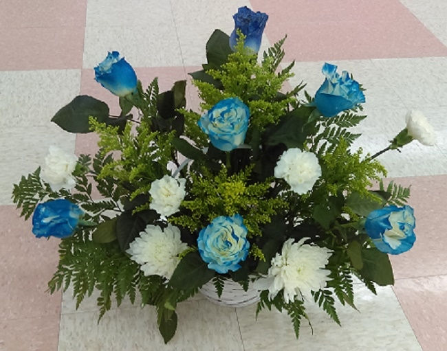 Blue flowers, painted roses in blue and white flowers in a basket