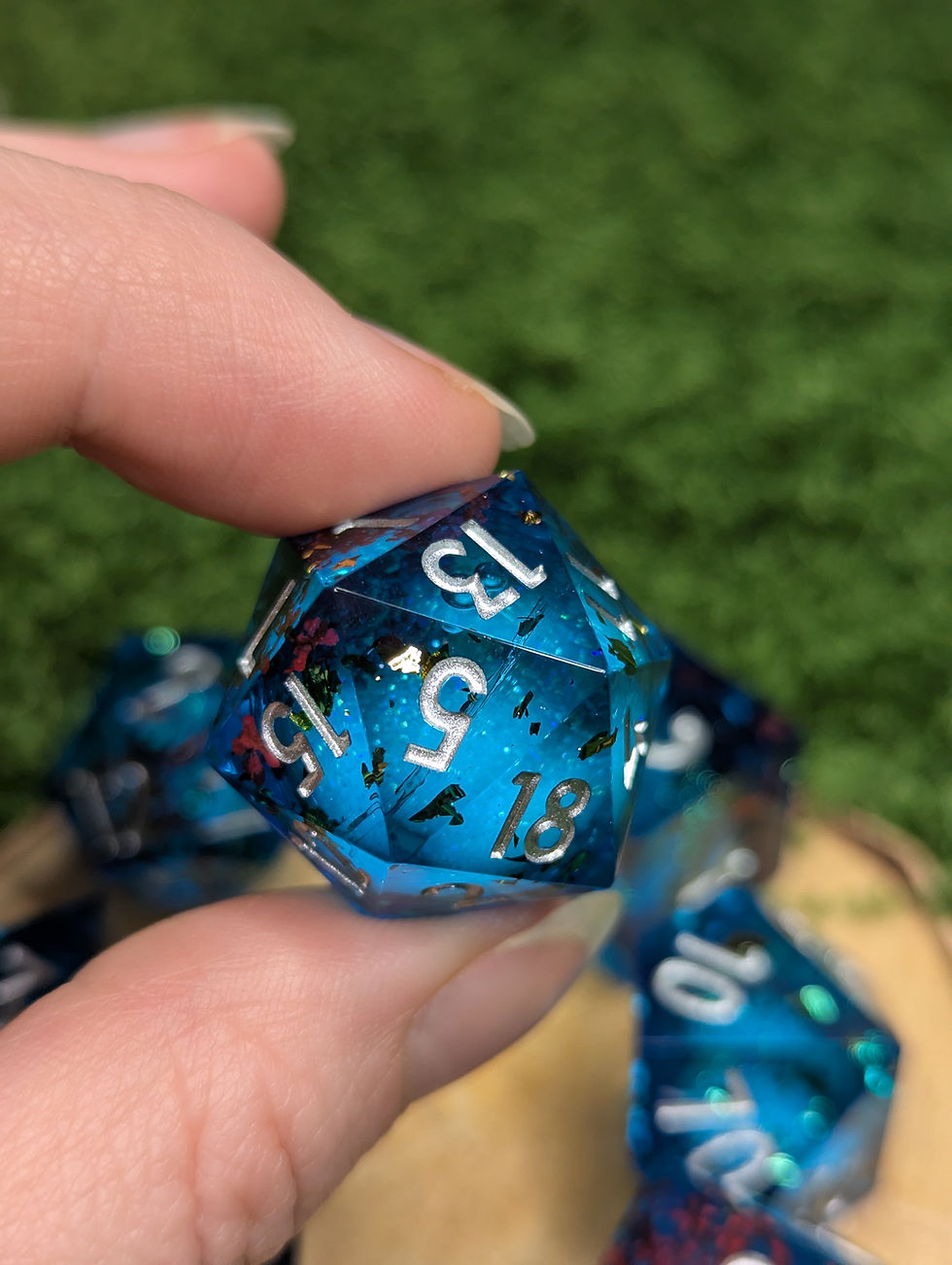 Thumbnail: Blue Liquid Core Dice Set with Red Flowers - Sharp Edge Resin