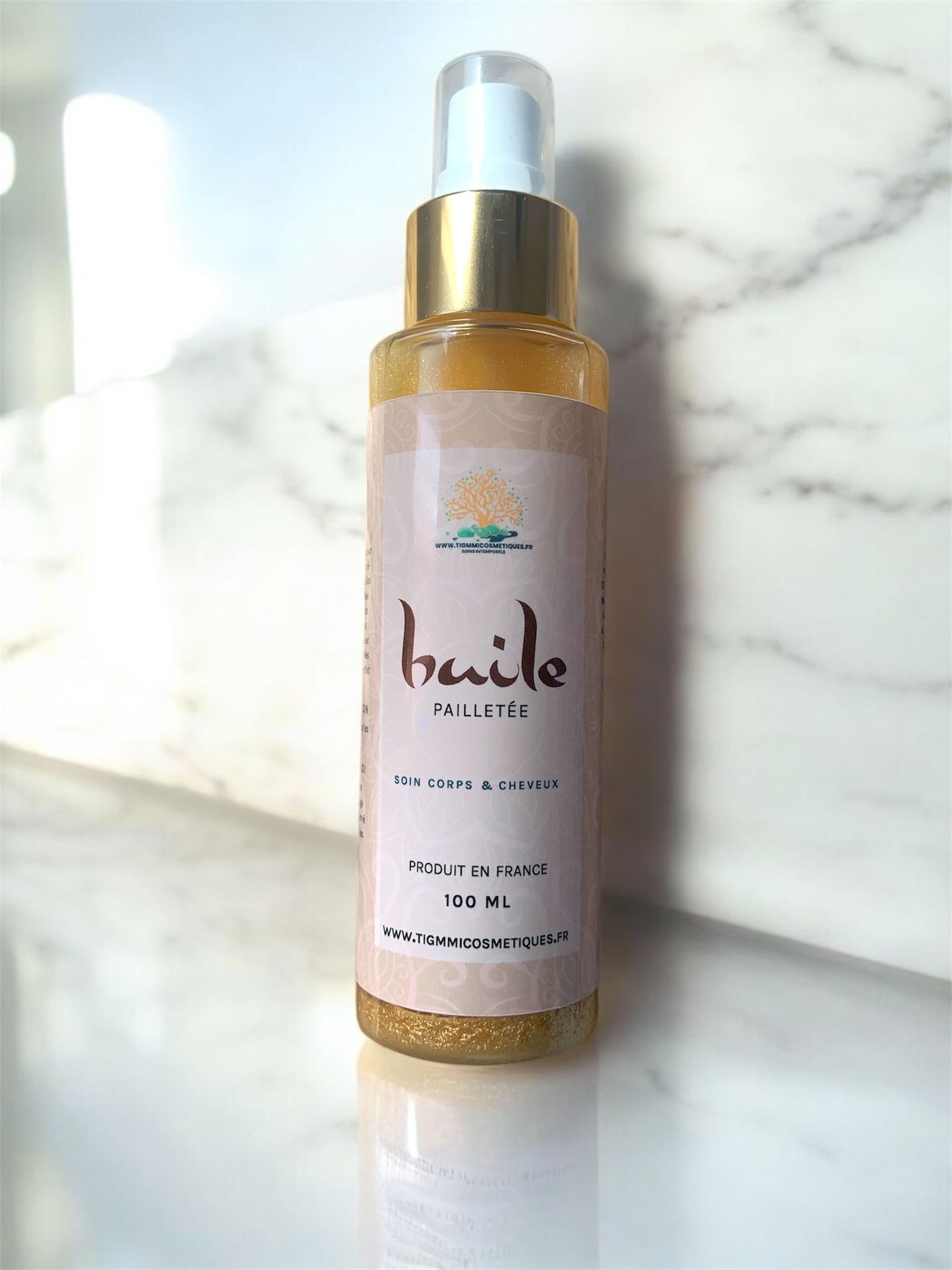 Huile pailletée soin corps et cheveux