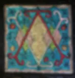 A Vodou flag created by the Haitian artist Raoul featuring Ayizan's vèvè, or ritual diagram.