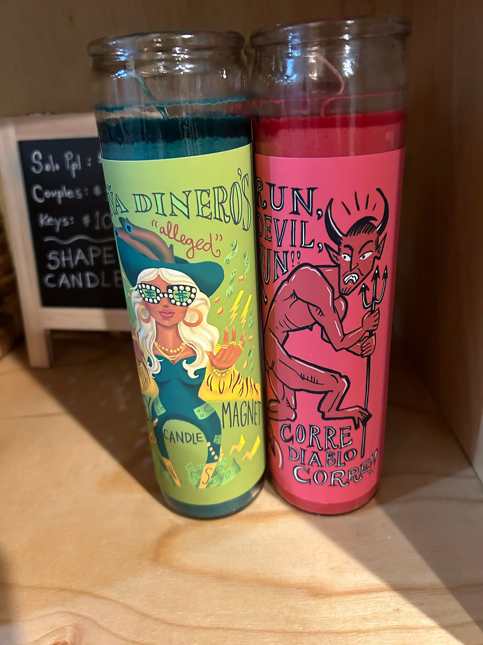 Botanica candles with labels created by the author