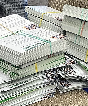 Postcards stacked that were delivered to IBHE_2025_11_12.jpg