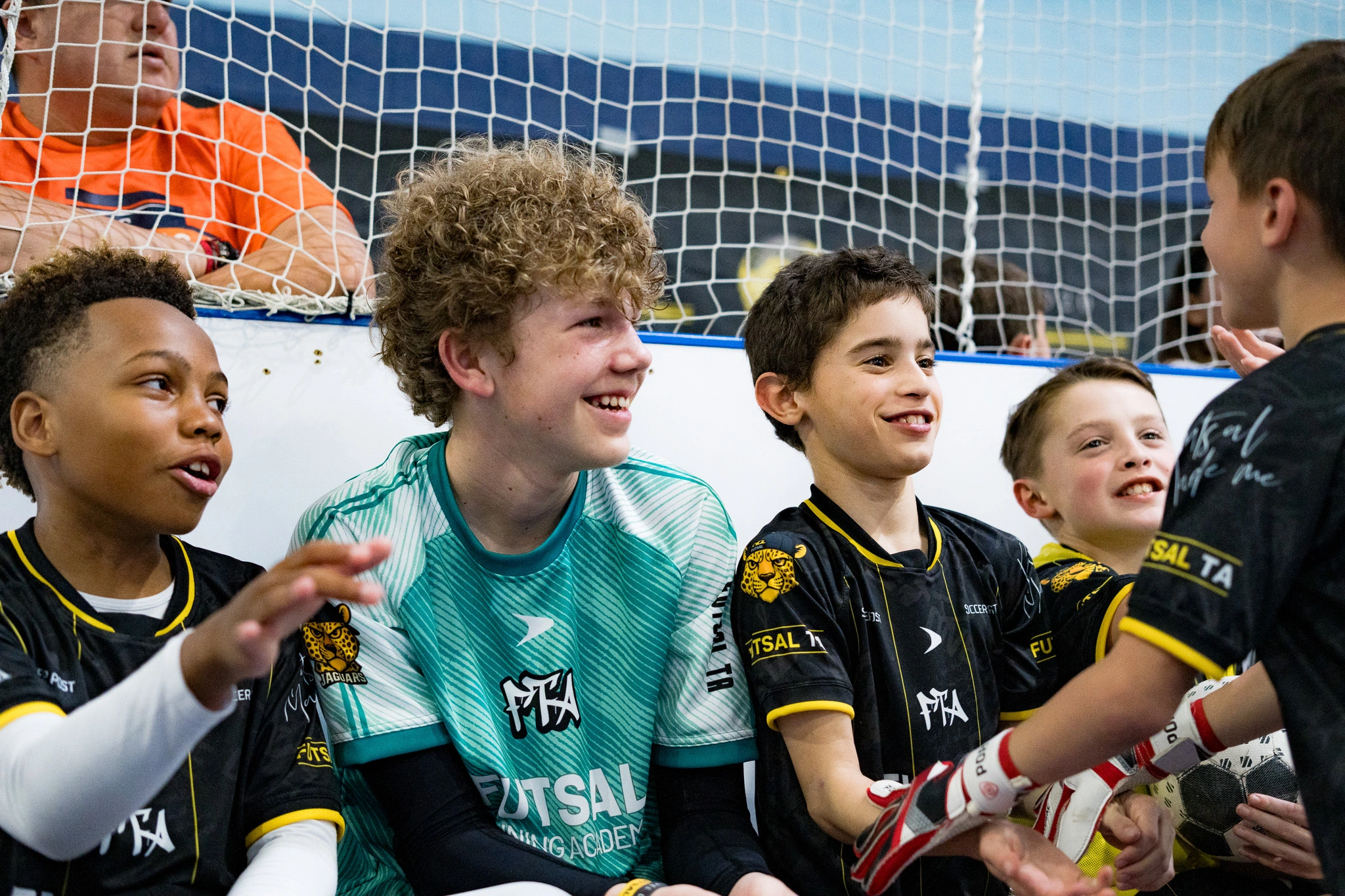 FTA Players smiling at each other