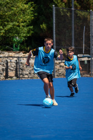 FTA Futsal Summer League player taking a shot on goal