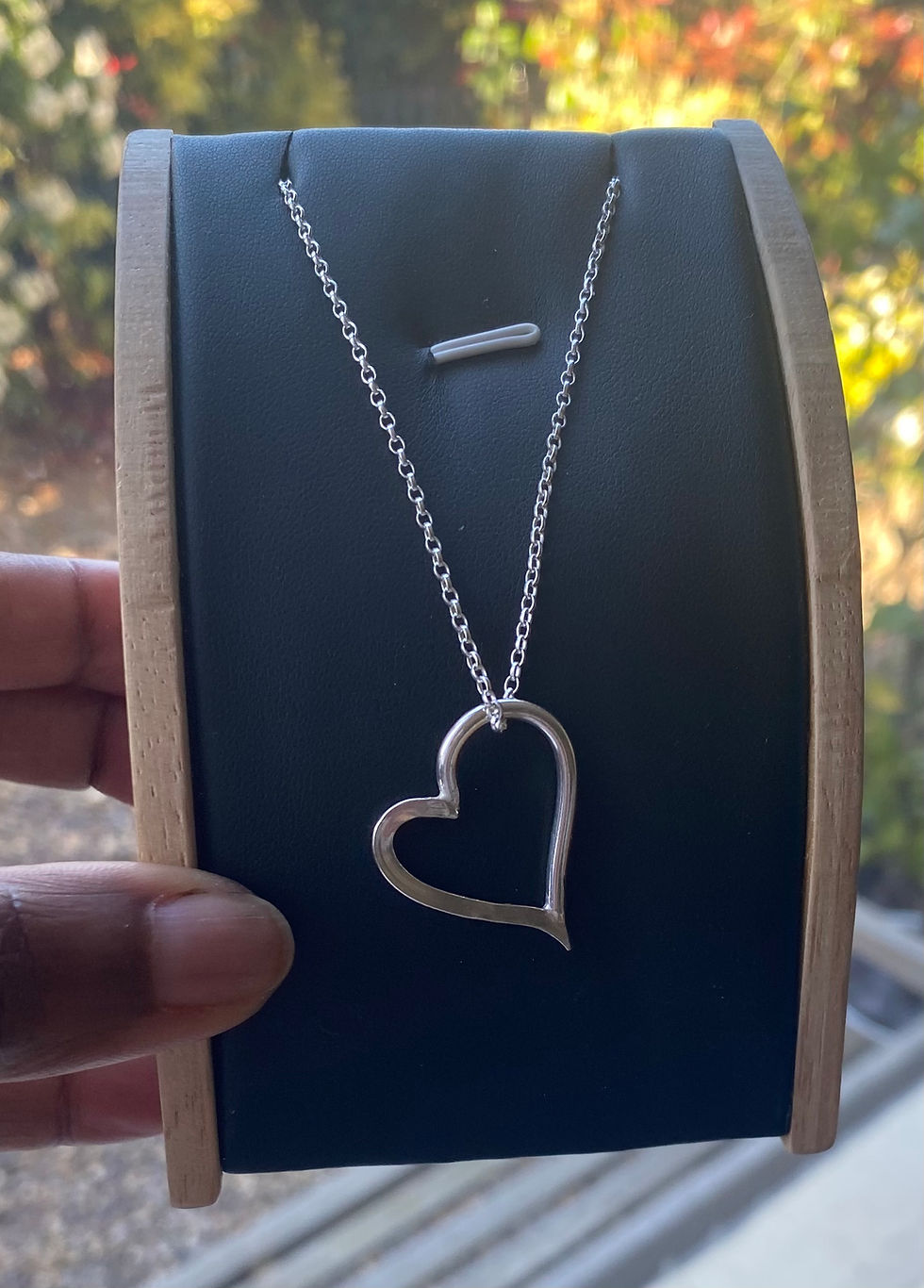 Thumbnail: Unscripted Heart sterling silver pendant with open asymmetrical design on belcher