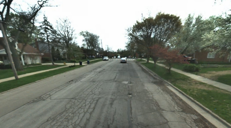7th street didn't need narrowing! It just needed a fresh coat of asphalt