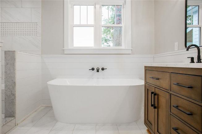 Tub with wall mount faucet