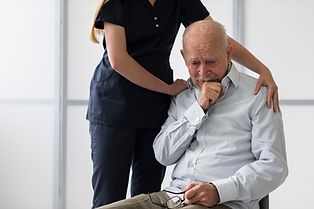 nurse-consoling-old-crying-man.jpg