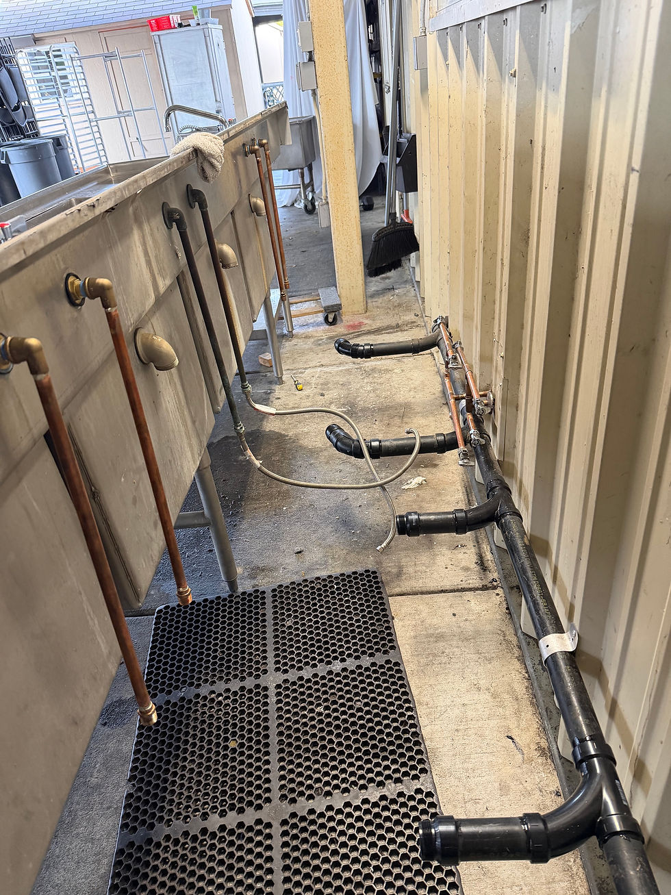 Commercial plumber near you installing complex piping lines.