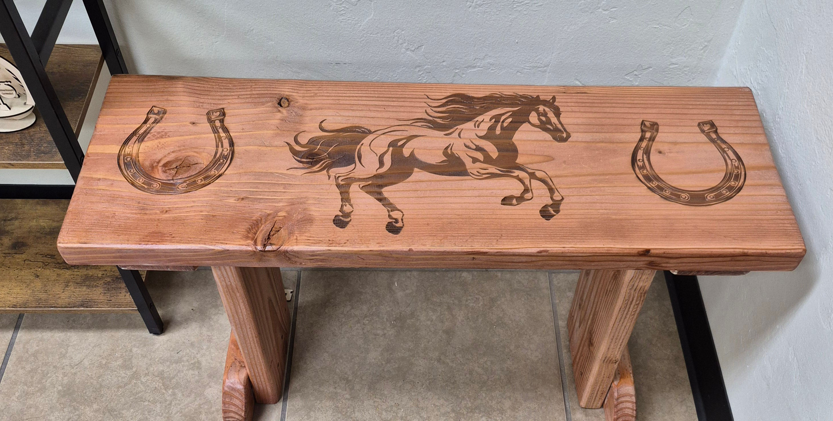 horse on wooden bench