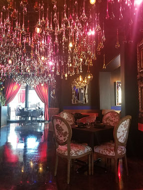 Glass drops hanging from ceiling at restaurant