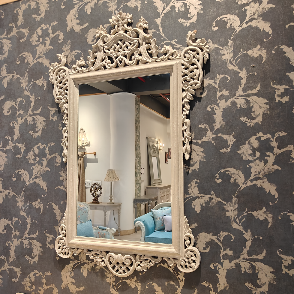 Elegant regal filigree mirror featuring intricate metalwork in a delicate pattern, framed beautifully to add a touch of sophistication to any room.