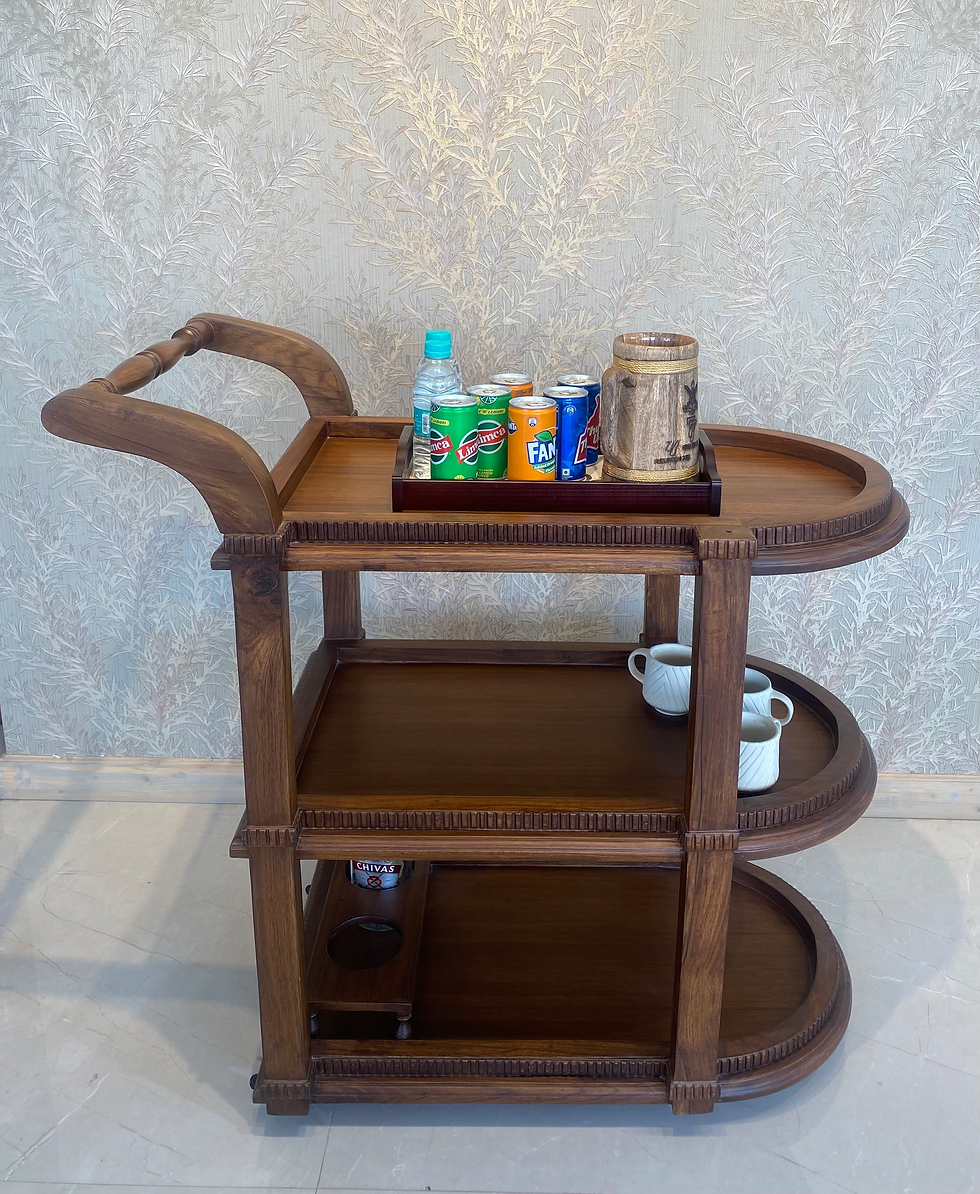 Classic Wooden Bar Cart designed with a refined finish, smooth rolling wheels, and spacious tiers for holding beverages and barware essentials.