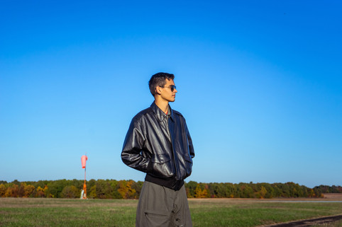 Male Senior Portrait with Plane
