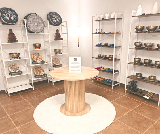 View of shelves with sound healing instruments
