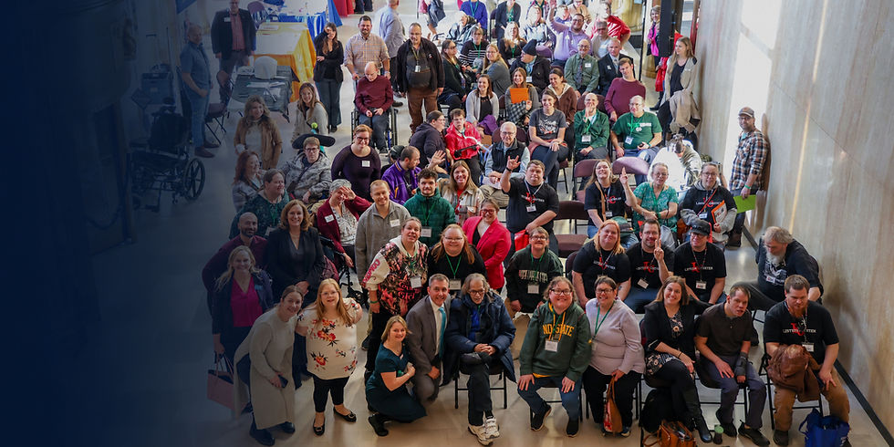 Group of disability advocates, self-advocates, families, and supporters gathered inside the North Dakota State Capitol.