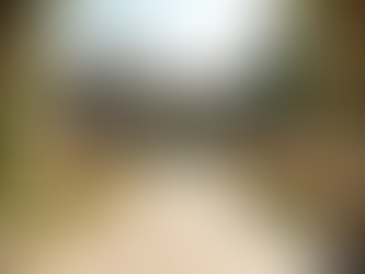 Eye-level view of a Tuscan villa wedding venue with floral decorations