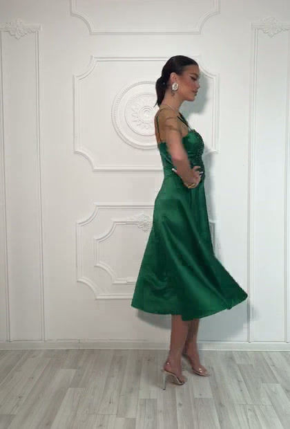 Thumbnail: Green Midi Dress with Baby Doll Skirt and Bust with Precious Lace Inserts 