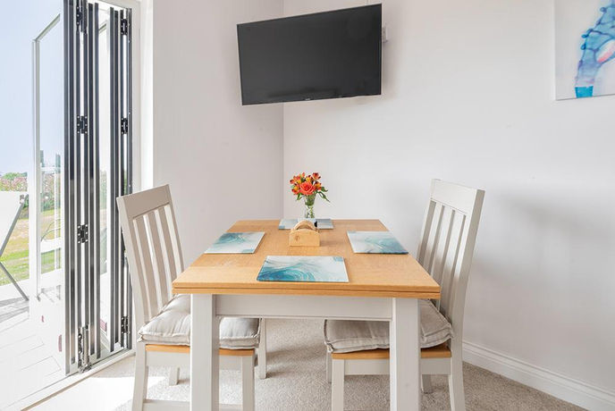 Greenside studio dining area