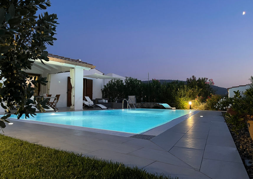 Pool and terrace lit under the stars – magical Sardinian evening at Villa Anna