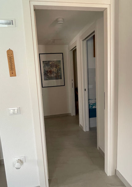 A glimpse of the hallway at Villa Agata, connecting the rooms with brightness and space.

