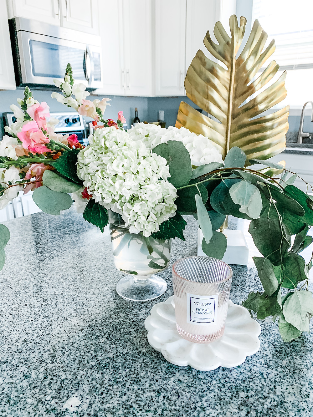 pink snapdragons, white hydrangeas, eucalyptus flower arrangement