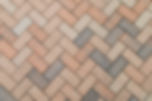 red brick pavers in herringbone pattern