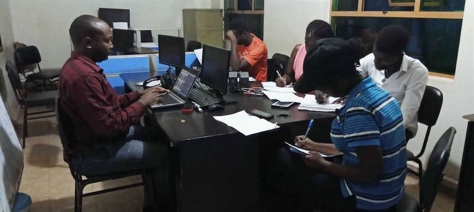 FTN Studio’s Prof. Tinka C. Muhwezi leads a multimedia training session for Mass Communication students at UTAMU University in Kampala.