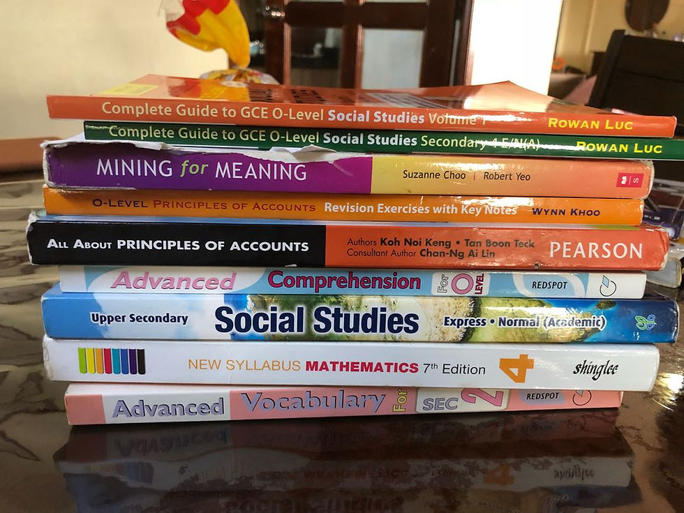 A stack of secondary text books, Secondary text books, new curriculum, new text books, change in curriculum