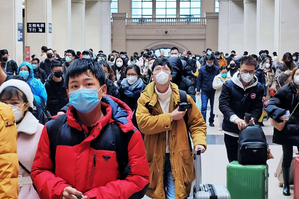 Masked Chinese passengers wait at a terminal in Wuhan Province, coronavirus outbreak affects transport in China, SARS Virus, a crowd of Chinese passengers wearing respiratory masks