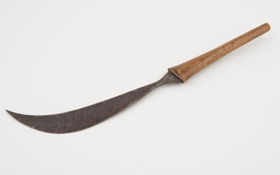 Historical curved steel caesarean knife with a wooden handle from Bunyoro Kingdom, Uganda, used in the 1879 C-section operation documented by Robert Felkin. The blade was part of a sophisticated surgical toolkit that helped save both mother and baby.