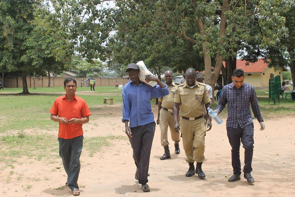 Some of the culprits being taken to the police station in Koboko, Koboko, Increase in prices of goods, Uganda Police, Police, Arrests in Uganda, Traders, Vendors, Commodities