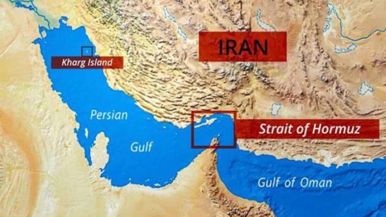 This geographic visualization details the Persian Gulf region, specifically identifying the Strait of Hormuz—a narrow 21-mile-wide chokepoint connecting the Gulf to the Gulf of Oman and the Arabian Sea. The map also pinpoint's Kharg Island, a small but high-value coral outcrop 15 miles off Iran's coast that serves as the country’s primary crude oil export terminal. Together, these locations represent a global economic "single point of failure," where approximately 20 million barrels of oil and 20% of global liquefied natural gas (LNG) transit daily. Any disruption to these shipping lanes often leads to immediate volatility in international energy prices and global inflation risks.