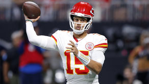 Patrick Mahomes throwing a pass