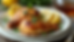 Close-up view of golden-brown roasted chicken thighs on a white plate