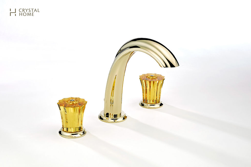 Polished gold faucet set with amber crystal handles by THG Paris, presented on a white background for a luxurious product showcase.