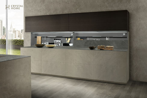 Composit Italian kitchen design featuring wood cabinetry, black countertop, and built-in lighting for a warm, modern atmosphere.
