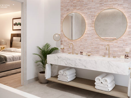 Elegant couple bathroom featuring a marble double vanity, soft beige textured wall tiles, round mirrors with warm backlighting, and a seamless connection to the bedroom.