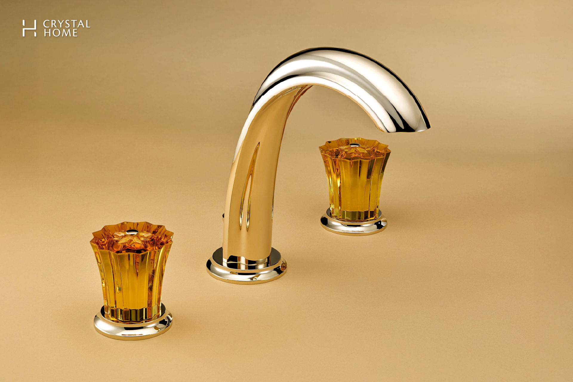 Close-up of THG Paris luxury gold bathroom faucet with amber crystal handles, showcasing artisanal detailing and premium craftsmanship.