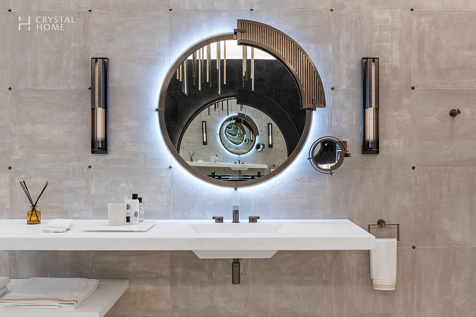 Contemporary bathroom with illuminated circular mirror and THG Paris matte bronze faucet set, framed by soft ambient lighting.