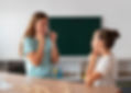 psychologist-helping-girl-speech-therapy.jpg