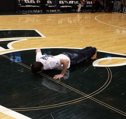 Kissing the floor at Breslin Center