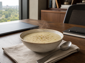 Creamy cauliflower and leek soup garnished with fresh chives in an elegant bowl for a Diabetes-friendly meal
