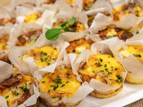 Six spinach, tomato and Parmesan mini quiches with lemon-herb Greek yogurt