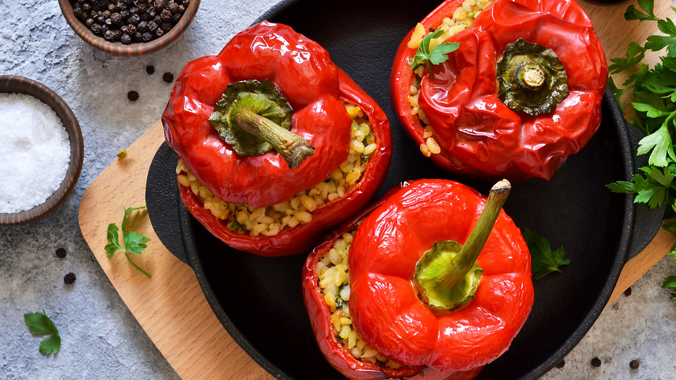 Rice lentil quinoa stuffed peppers with lemon Parmesan herbs