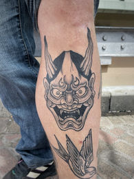 black and grey tattoo, done by tattoo artist Josh White in Cape Town
