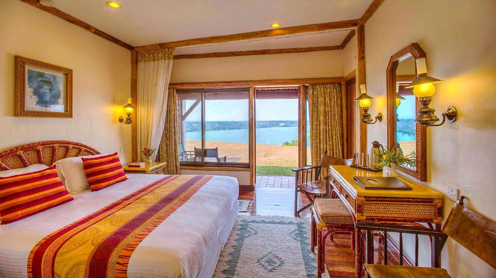 A cozy hotel bedroom with a sea view and a desk, Perky Africa Tours.