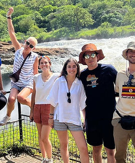 Group poses at Murchison falls Uganda wildlife adventure.