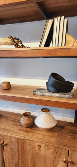 decorated bookshelf with ironweight